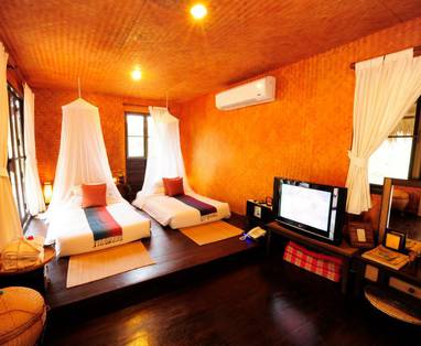 Isan Grand Deluxe slaapkamer bij Phu Na Come Resort, Isaan regio, Thailand