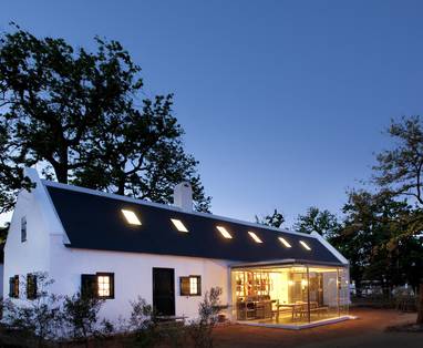 FARM_HOTEL_-_TWO_BEDROOM_COTTAGE_WITH_GLASS_KITCHEN_AT_NIGHT