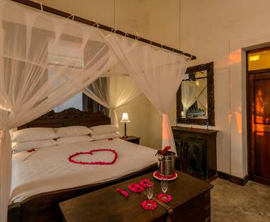 Honeymoon_sunset_turn_down_Kipira_interior