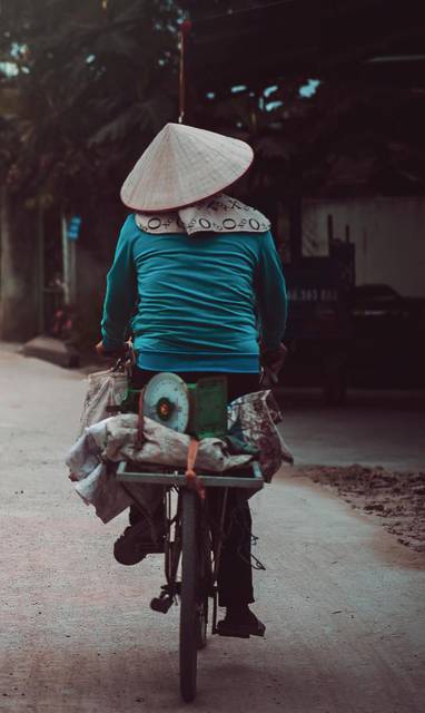 person-riding-a-bicycle-cycling-on-road-720360