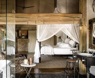 Singita-_Ebony_lodge-_suite_slaapkamer-min