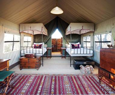 Uiterlijk slaapkamers bij Camp Kalahari in Botswana