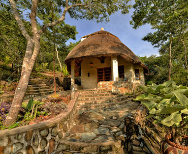 Chalets tussen het groen bij Musangano Lodge in Zimbabwe