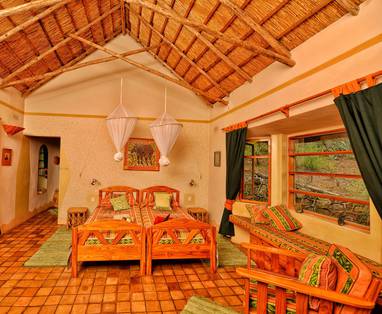 Inrichting slaapkamer van de chalets bij Musangano Lodge in Zimbabwe