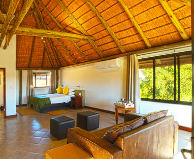slaapkamer bij Palmwag Lodge in Namibië