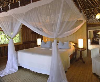 Interieur banda bij Mnemba Island Lodge in Tanzania