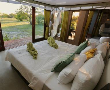 slaapkamer in tenten bij oberland lodge