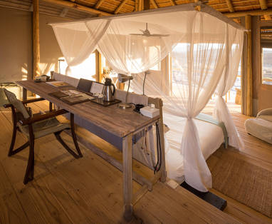 slaapkamer bij Damaraland Camp in Namibië
