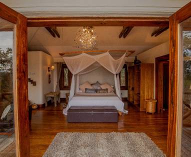 slaapkamer bij Escarpment Luxury Lodge in Tanzania