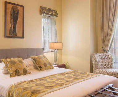 slaapkamer bij House of Waine in Kenia