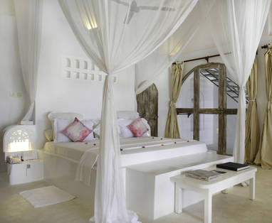 villa slaapkamer bij Msambweni Beach House in Kenia