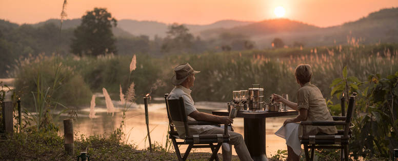 Diner bij zonsondergang bij Four Seasons Golden Triangle in Chiang Rai