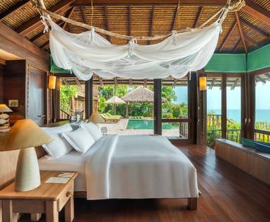 Slaapkamer bij Six Senses Yao Noi op Koh Yao Noi