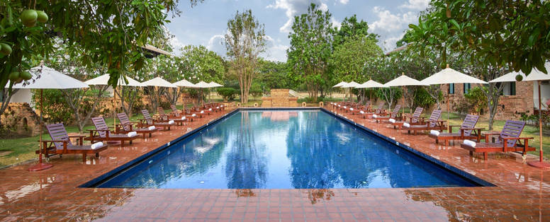 Zwembad bij Sukhothai Heritage Resort bij Sukhothai, Thailand