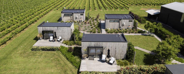 Vier cabins  bij Matawhero in Gisborne, Nieuw-Zeeland
