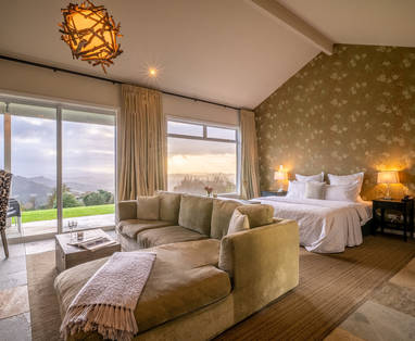 Slaapkamer villa bij Woodhouse Mountain Lodge, Warkworth in Nieuw-Zeeland