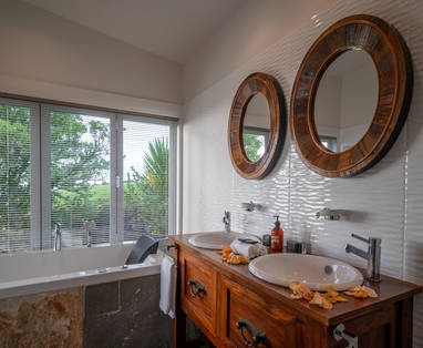 Badkamer villa bij Woodhouse Mountain Lodge, Warkworth in Nieuw-Zeeland