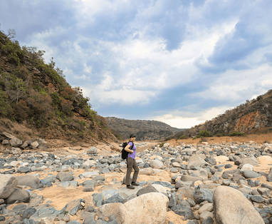 Traveller-posing-in-river-bed