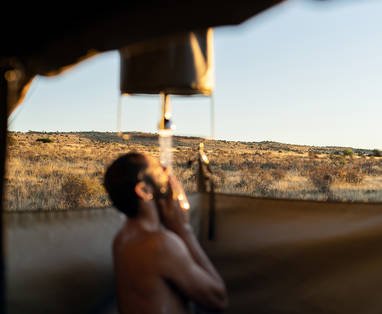 Samara-plains-camp-bucket-shower-experience-honest-work-maike-mcneill